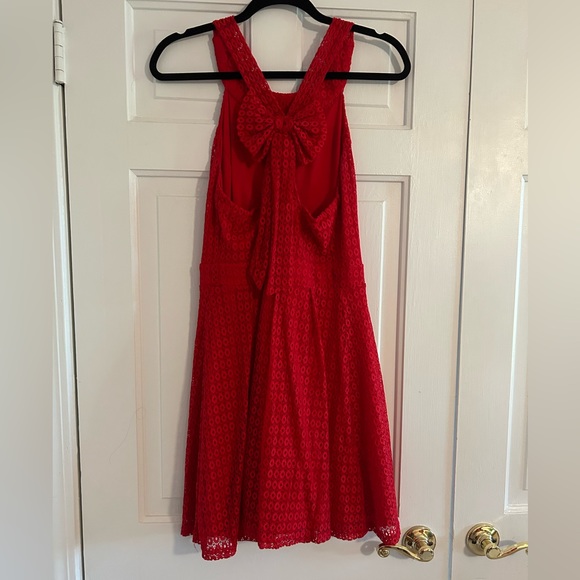 Red dress that hits above the knee (if you’re around 5’5”). Only worn once! - Picture 2 of 3